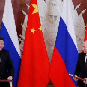 FILE PHOTO: Russian President Vladimir Putin and his Chinese counterpart Xi Jinping look on during a signing ceremony in Moscow, Russia, June 5, 2019. REUTERS/Evgenia Novozhenina/File Photo
