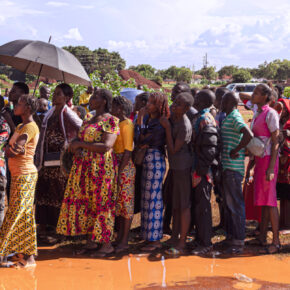 Voters queue as they wait to cast their ballots at a polling station at Bwakya school in Lubumbashi on December 21, 2023. - Voting continued in the Democratic Republic of Congo on December 21, 2023 in a general election marked by severe logistical troubles that meant some polling stations never opened. (Photo by Patrick Meinhardt / AFP)